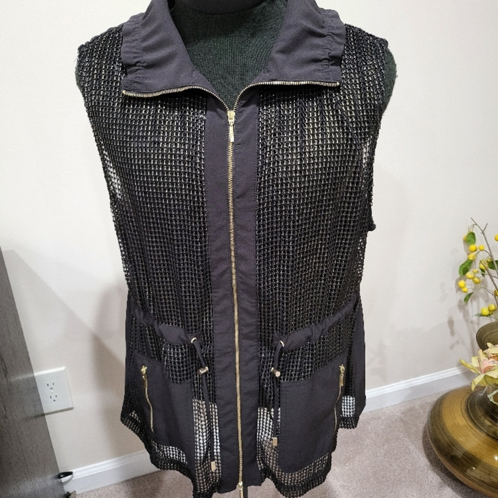 Black Sleeveless Vest . Chico's zenergy, SZ 3. Gold color hardware